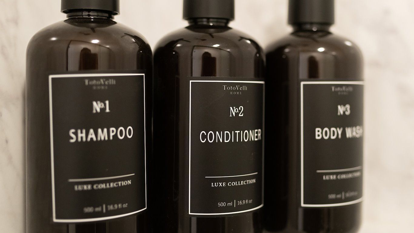 Three dark bottles labeled 