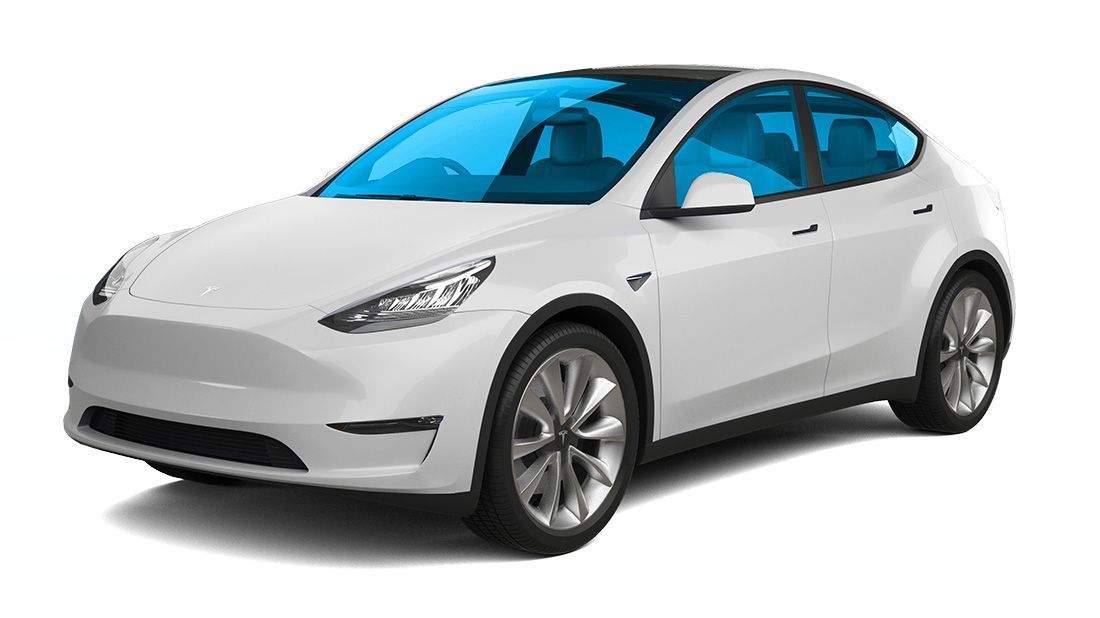 A blue tesla model s is on a black background.