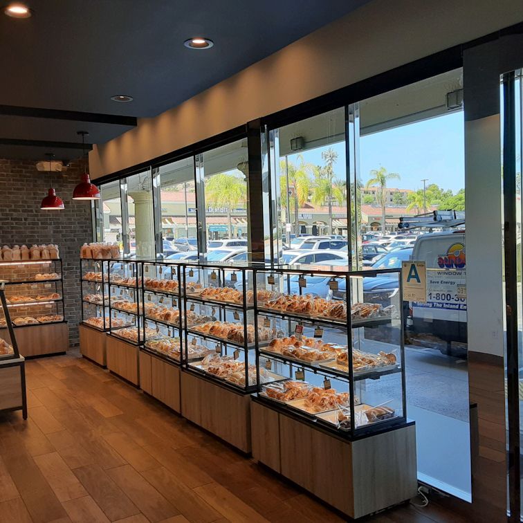 A bakery with a lot of bread on display