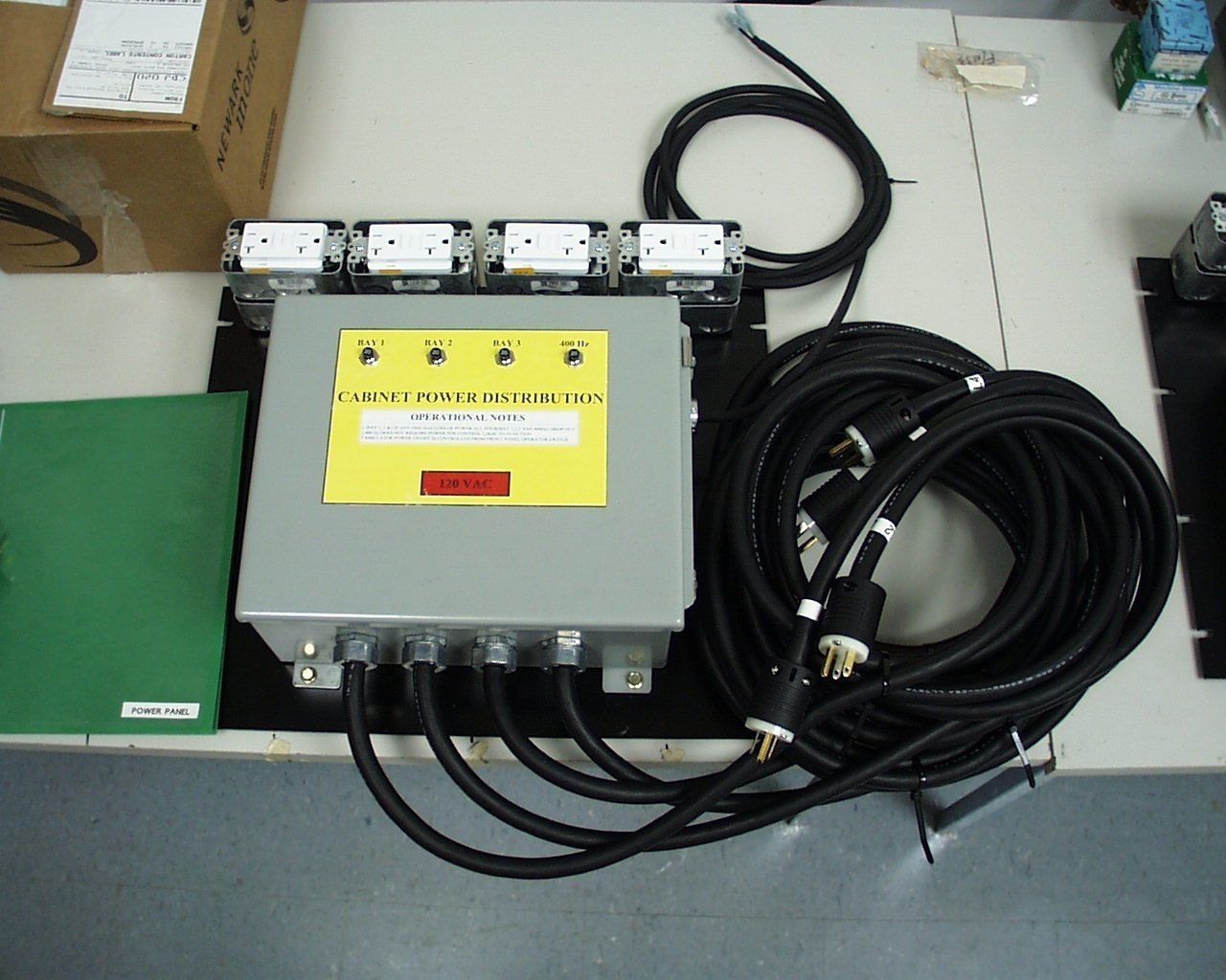 A box with a yellow label that says ' electrical ' on it