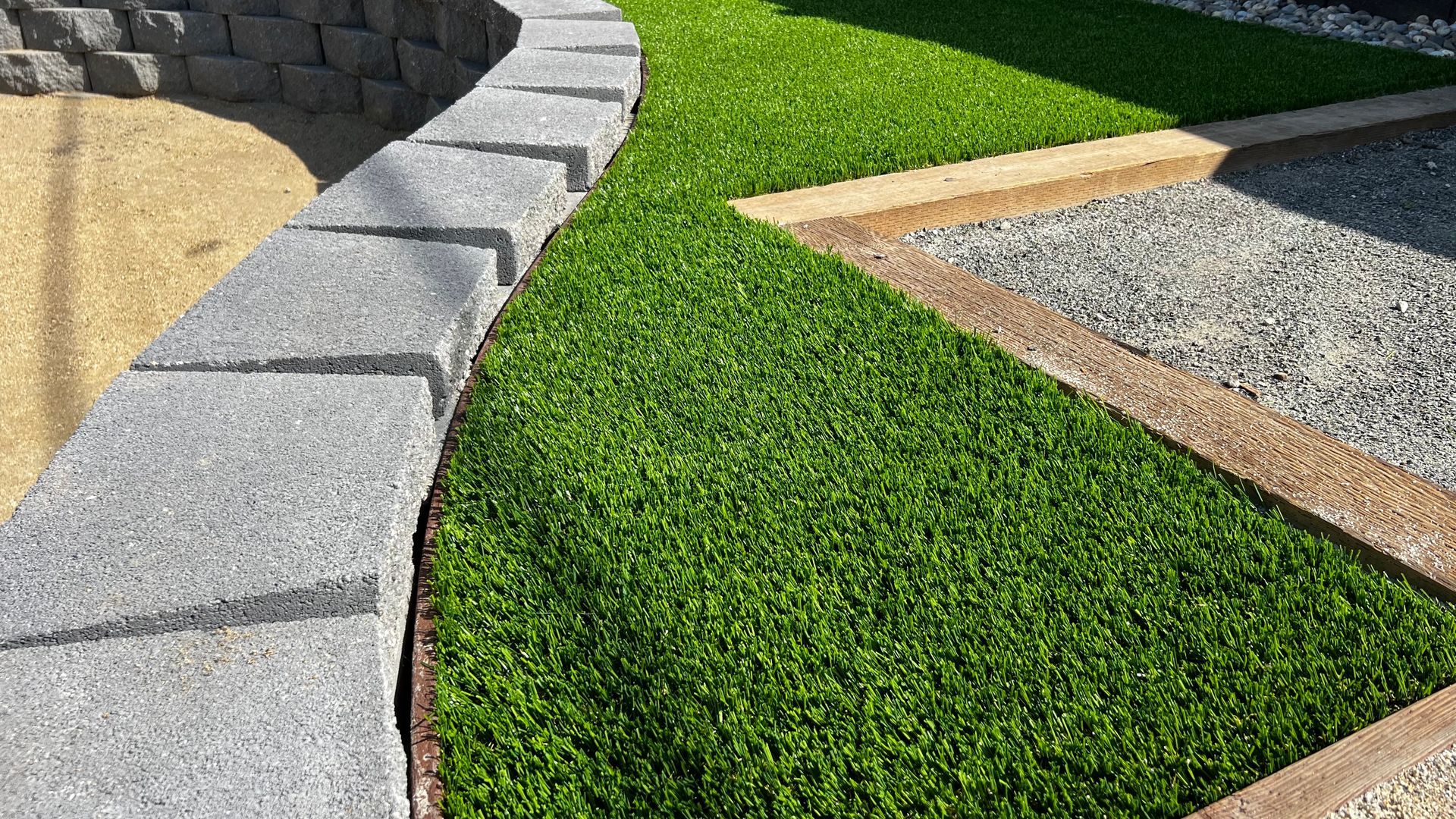 artificial grass around a planter