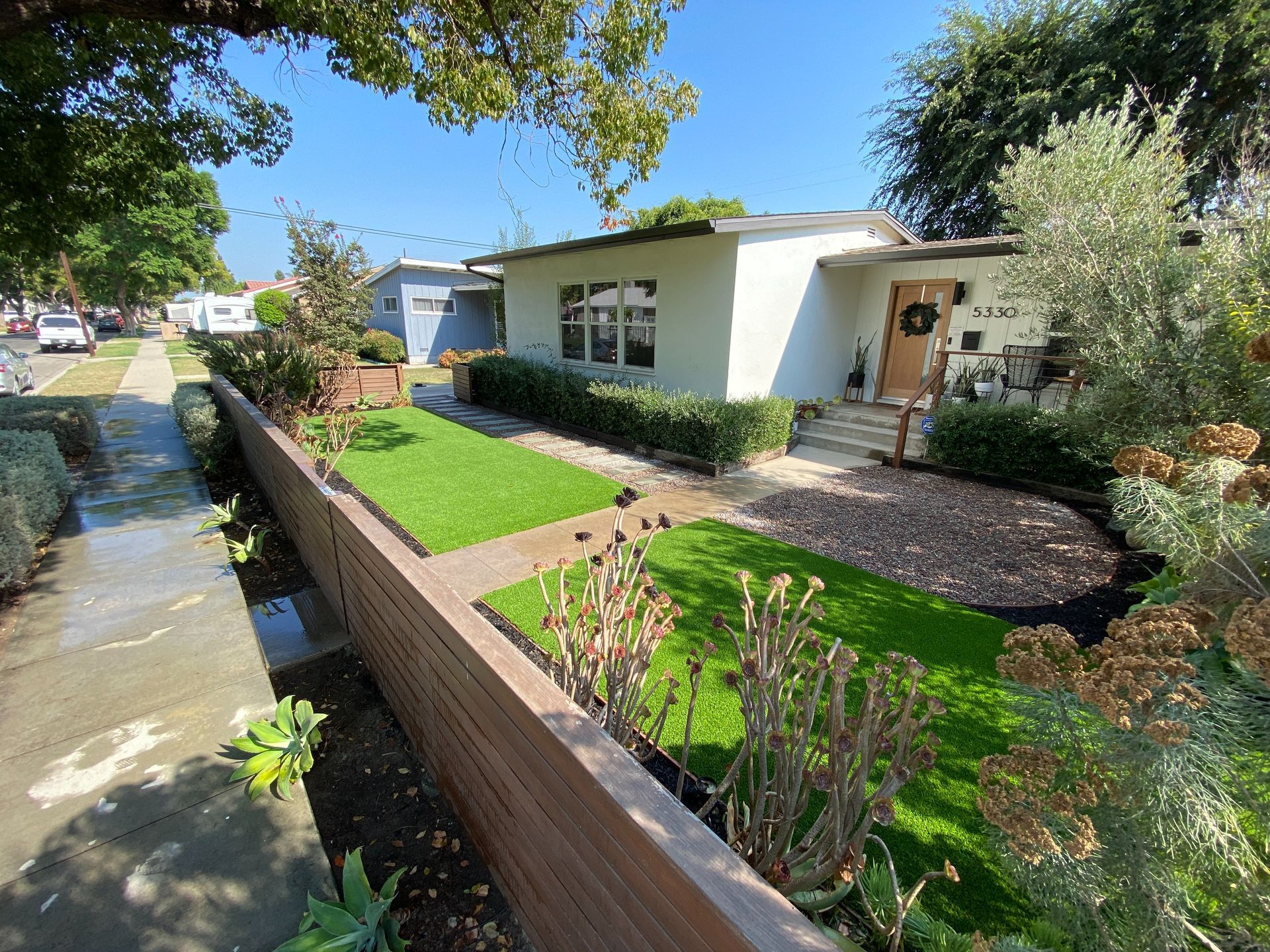 artificial grass next to pool