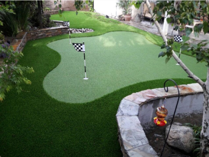 small artificial putting green in yard