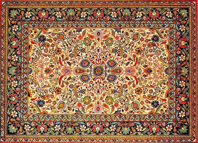 A colorful rug with a floral pattern on it