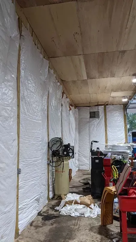 A garage filled with lots of tools and equipment.