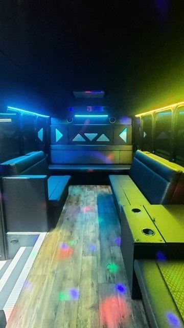 A room with a lot of furniture and lights on it.