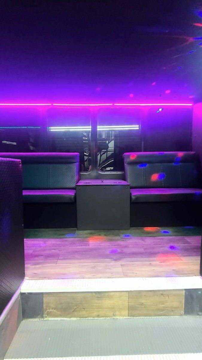 There are a lot of purple lights in the room.