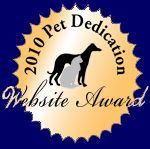 2010 Pet Dedication Website Award. Gold emblem with dog, cat silhouette on blue.