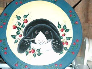 Round painted rabbit with strawberries.