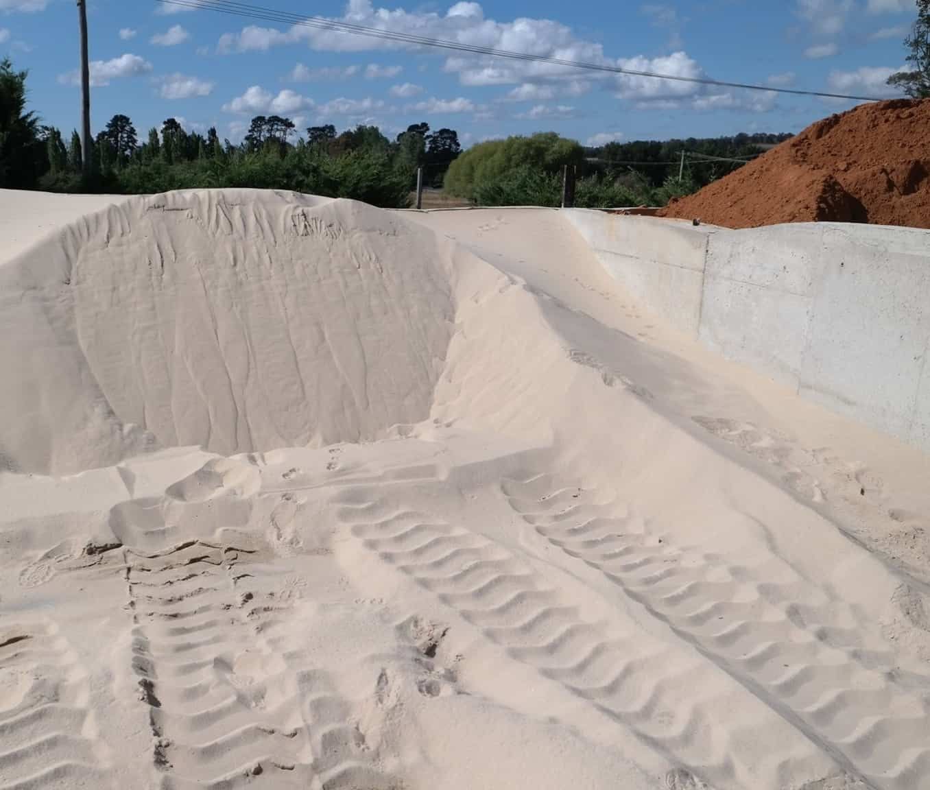 A pile of sand with tire tracks in it — Pigot's Mid Western Sand and Soil In Orange, NSW