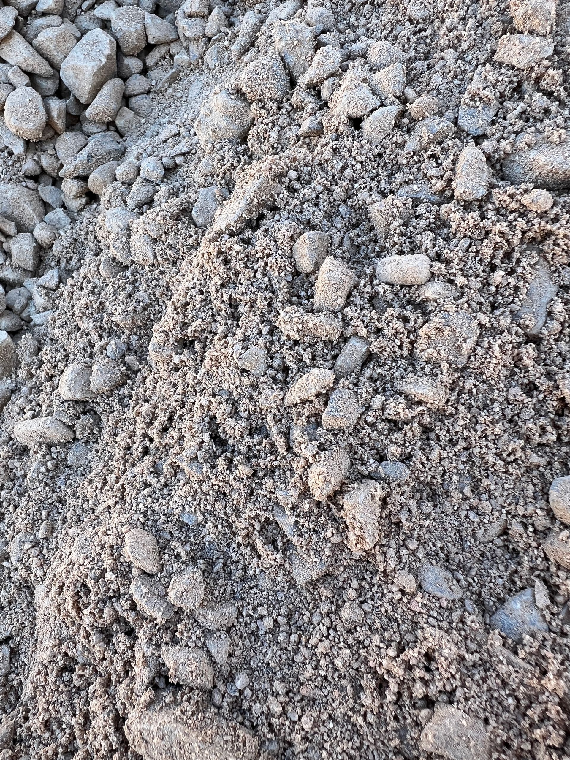 A pile of gravel is sitting on top of a pile of dirt — Pigot's Mid Western Sand and Soil In Orange, NSW