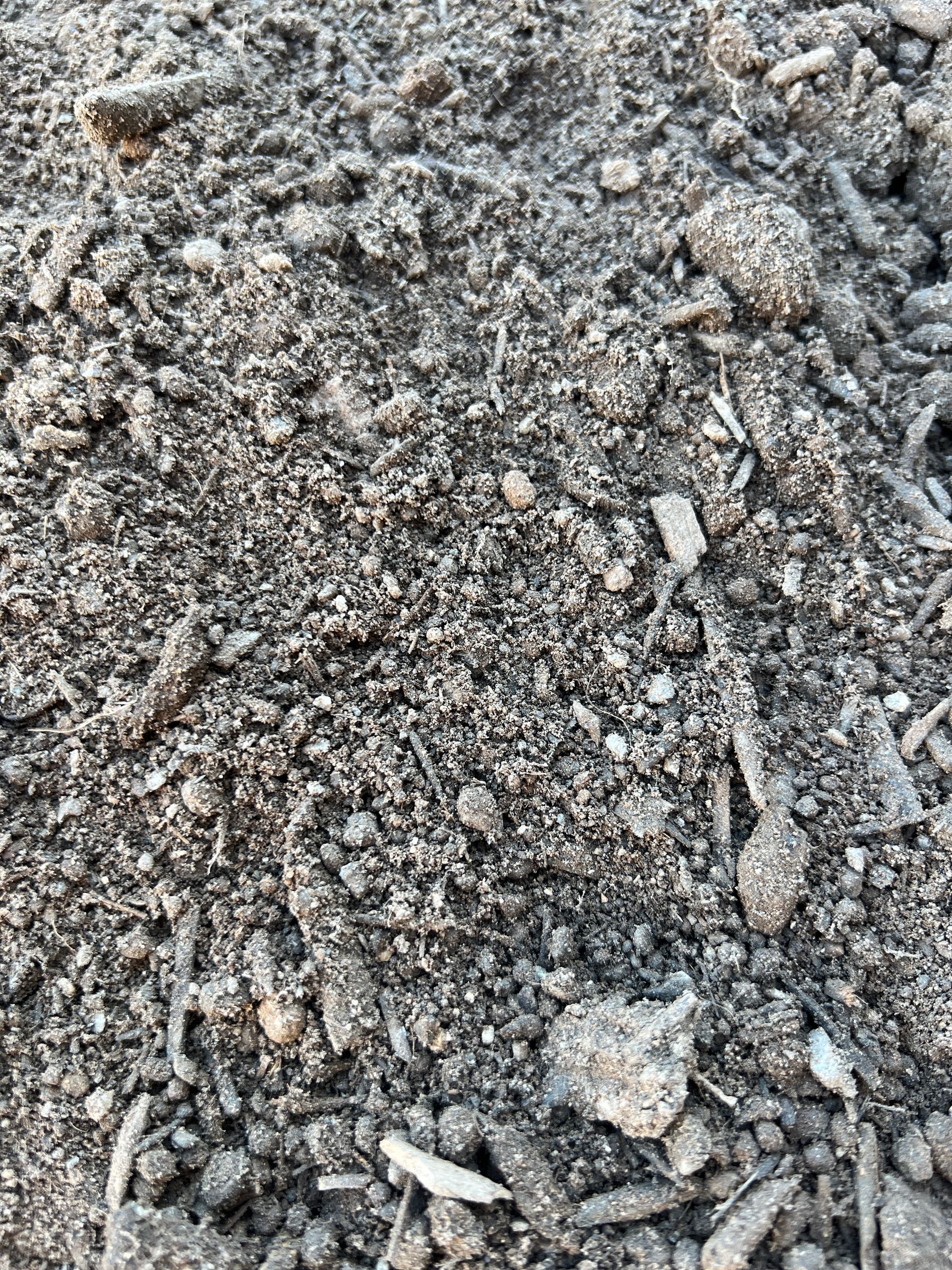 A pile of dirt and rocks is sitting on the ground — Pigot's Mid Western Sand and Soil In Orange, NSW