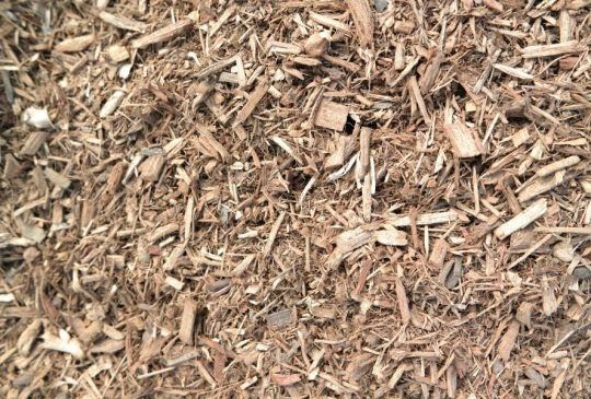 A Pile Of Wood Chips Is Sitting On The Ground — Pigot's Mid Western Sand and Soil In Orange, NSW