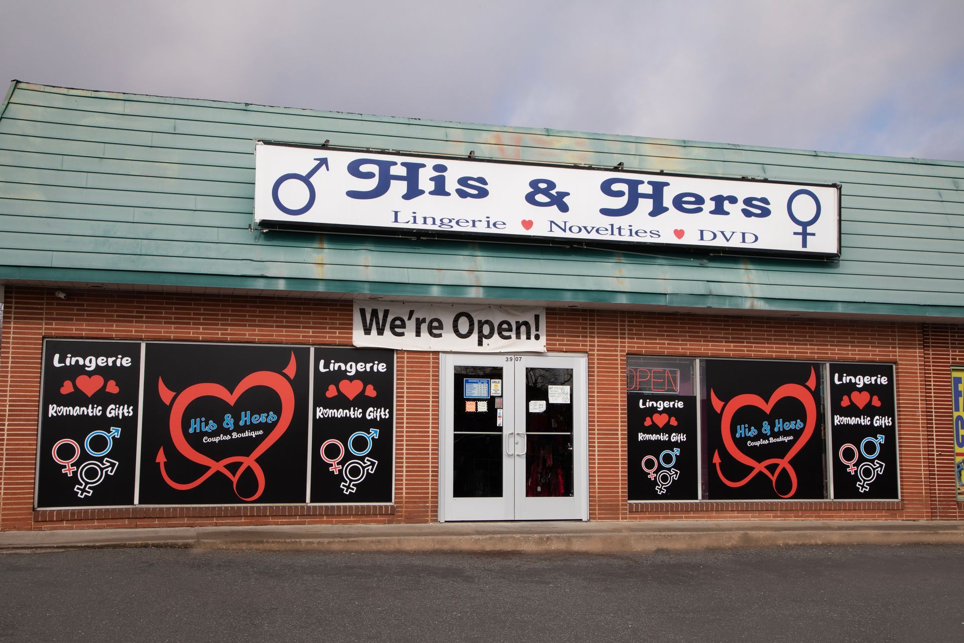His & Hers glass sign — Adult Toy Stor in Wilmington, DE