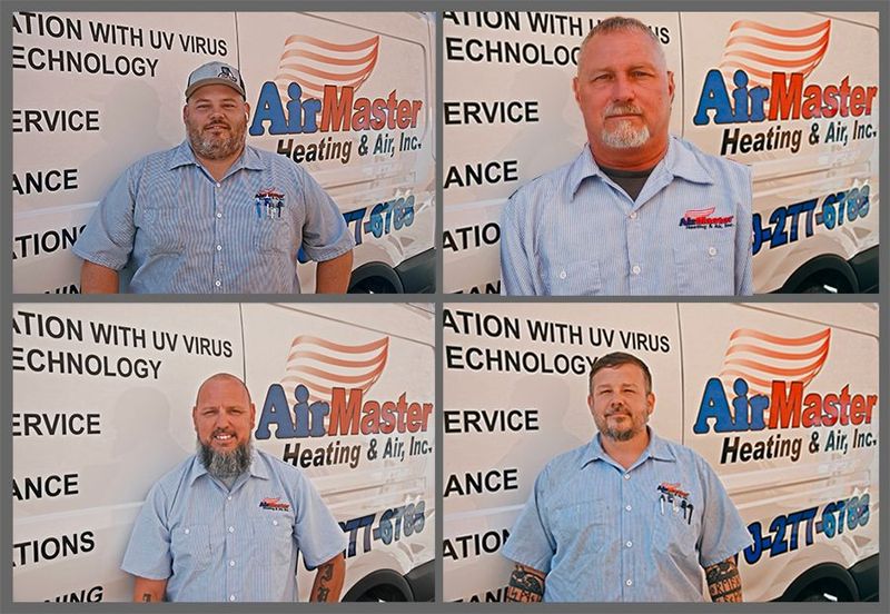 Four men are standing in front of an air master truck