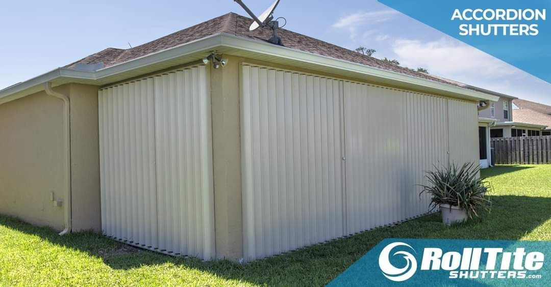 Accordion Shutter in the back of a house - Melbourne, FL - Roll Tite Shutters