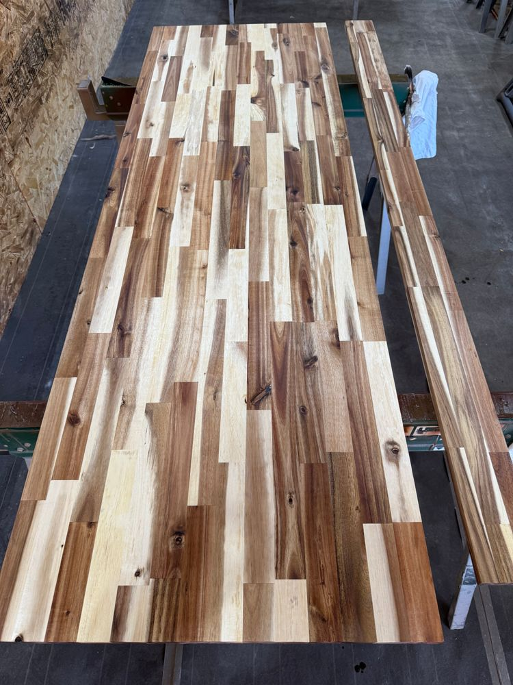A wooden table with a lot of pieces of wood on it