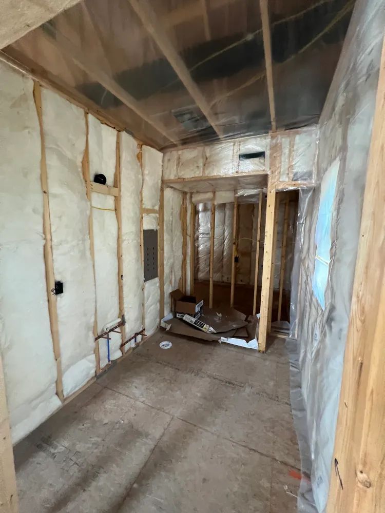 A room with a lot of insulation on the walls and ceiling.