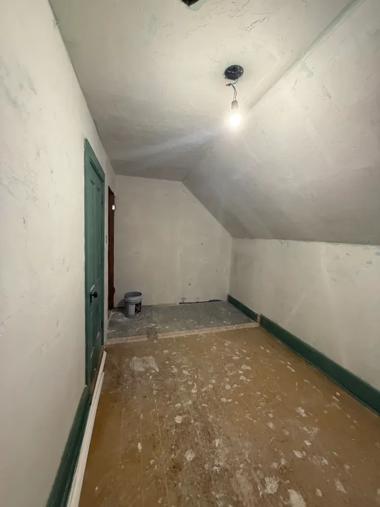 There is a light on the ceiling of the room.