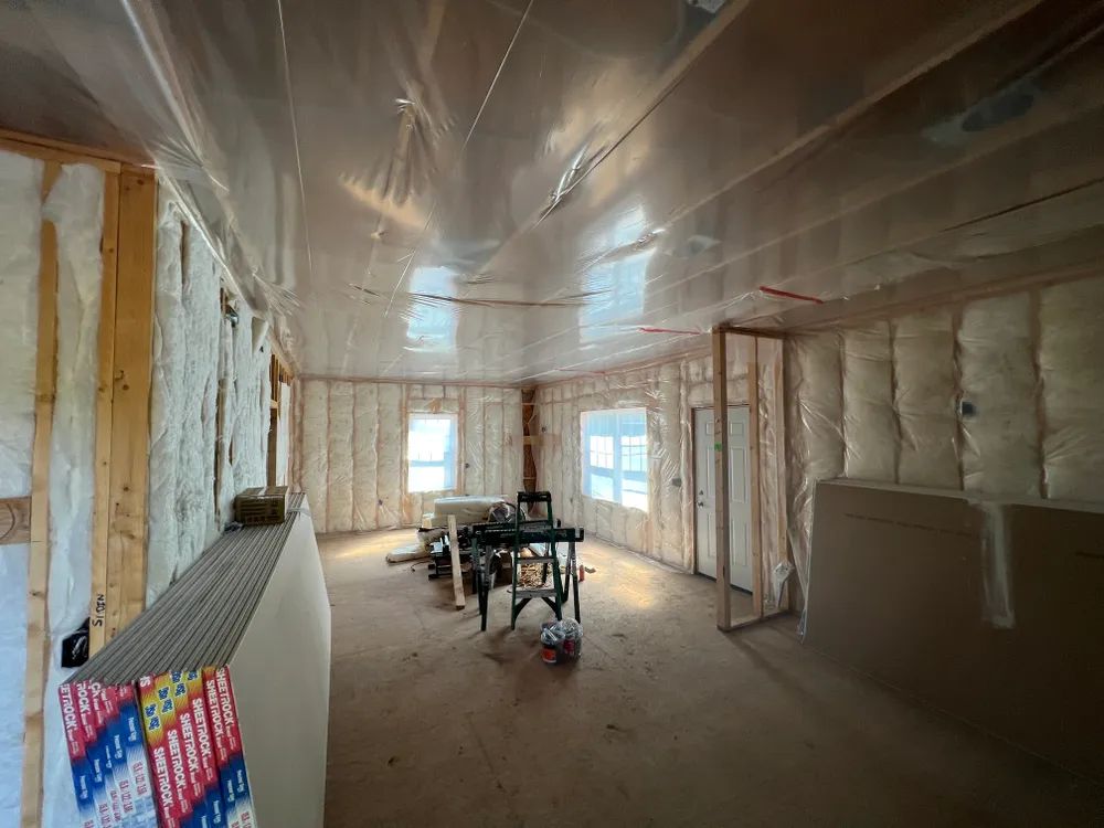A large room with a lot of insulation on the walls and ceiling.