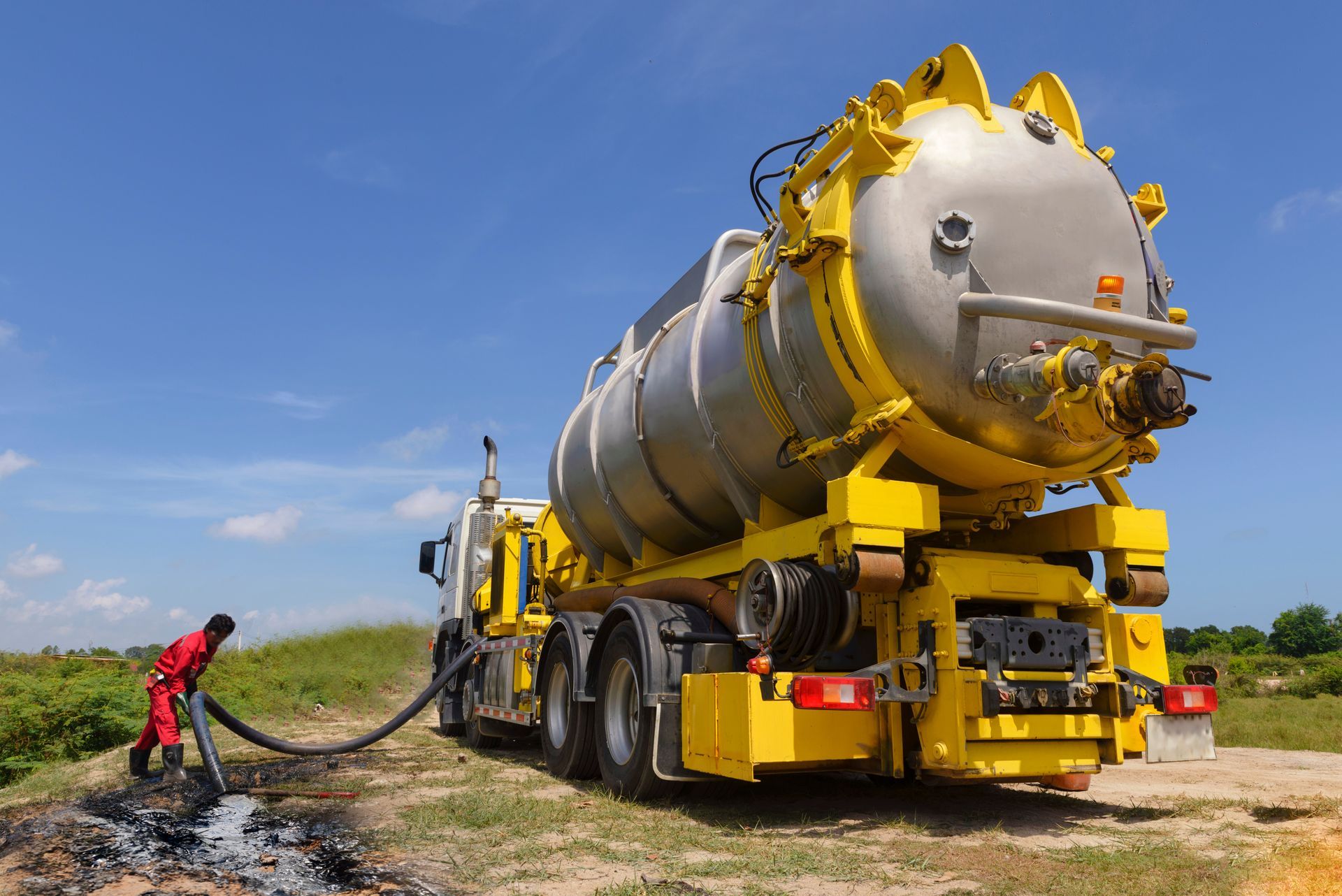Emergency vacuum truck for oil spill.