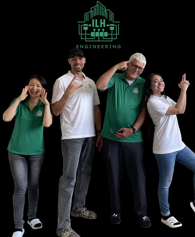 A group of people posing for a picture with a logo that says ilh