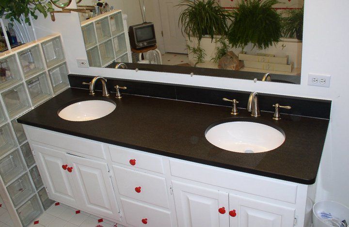 Granite sink with wide mirror — Powhatan, VA — Commonwealth Countertops