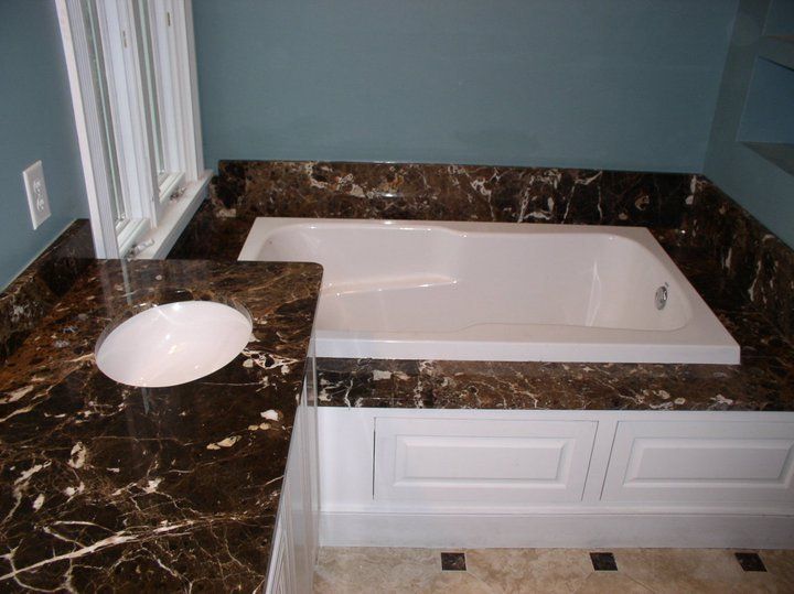 Bathtub with granite design — Powhatan, VA — Commonwealth Countertops