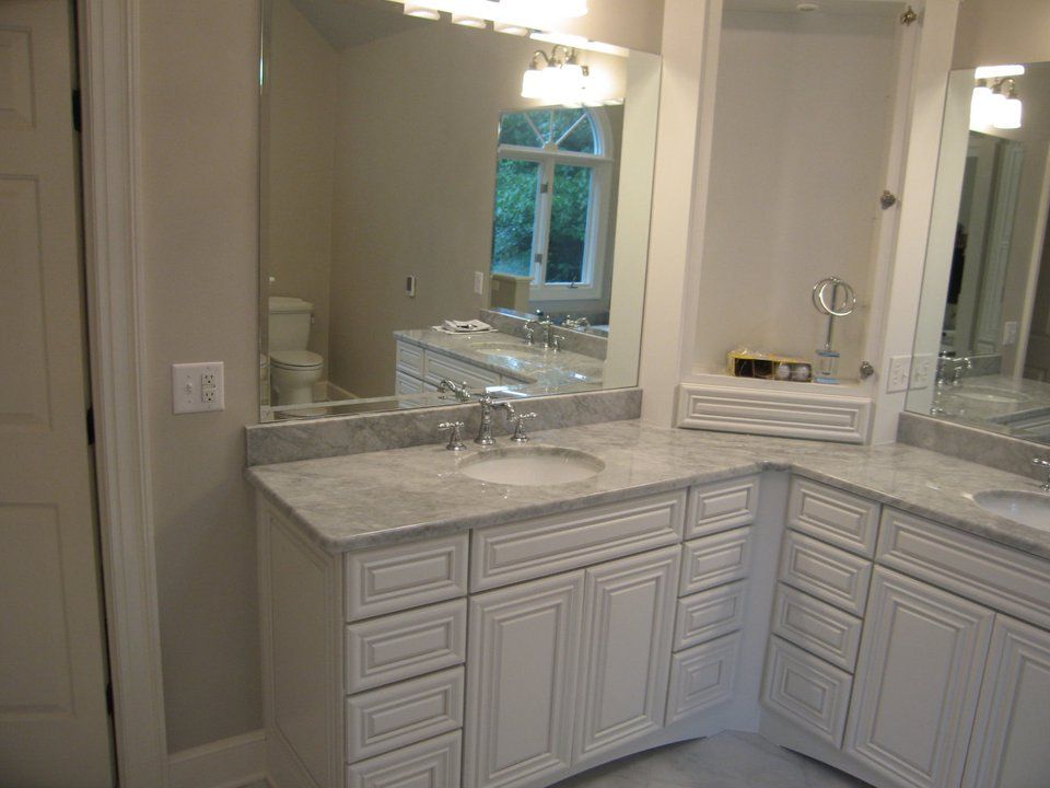 Bathroom with white cabinets — Powhatan, VA — Commonwealth Countertops