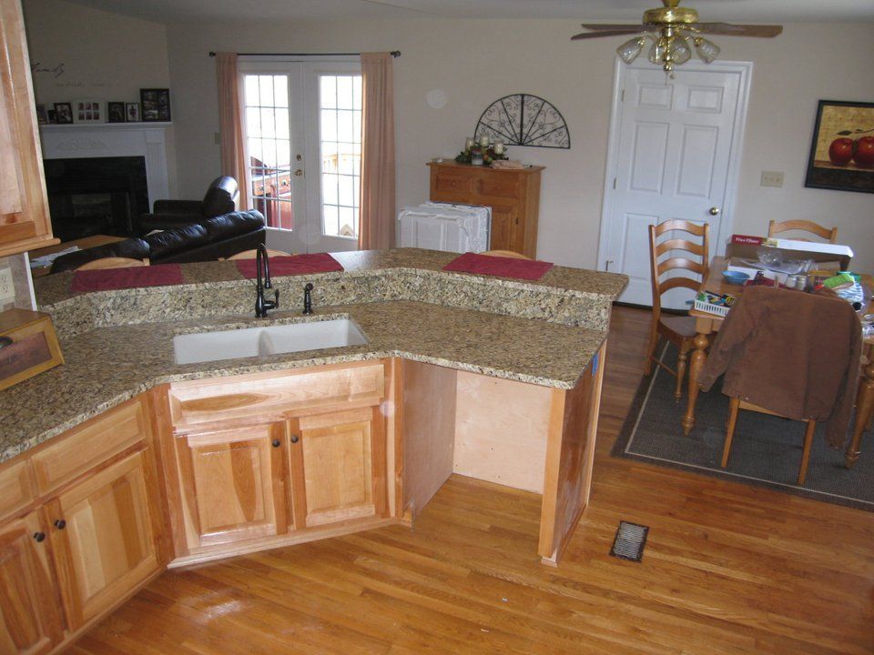 Another view of the ongoing installation of countertop and cabinets — Powhatan, VA — Commonwealth Countertops