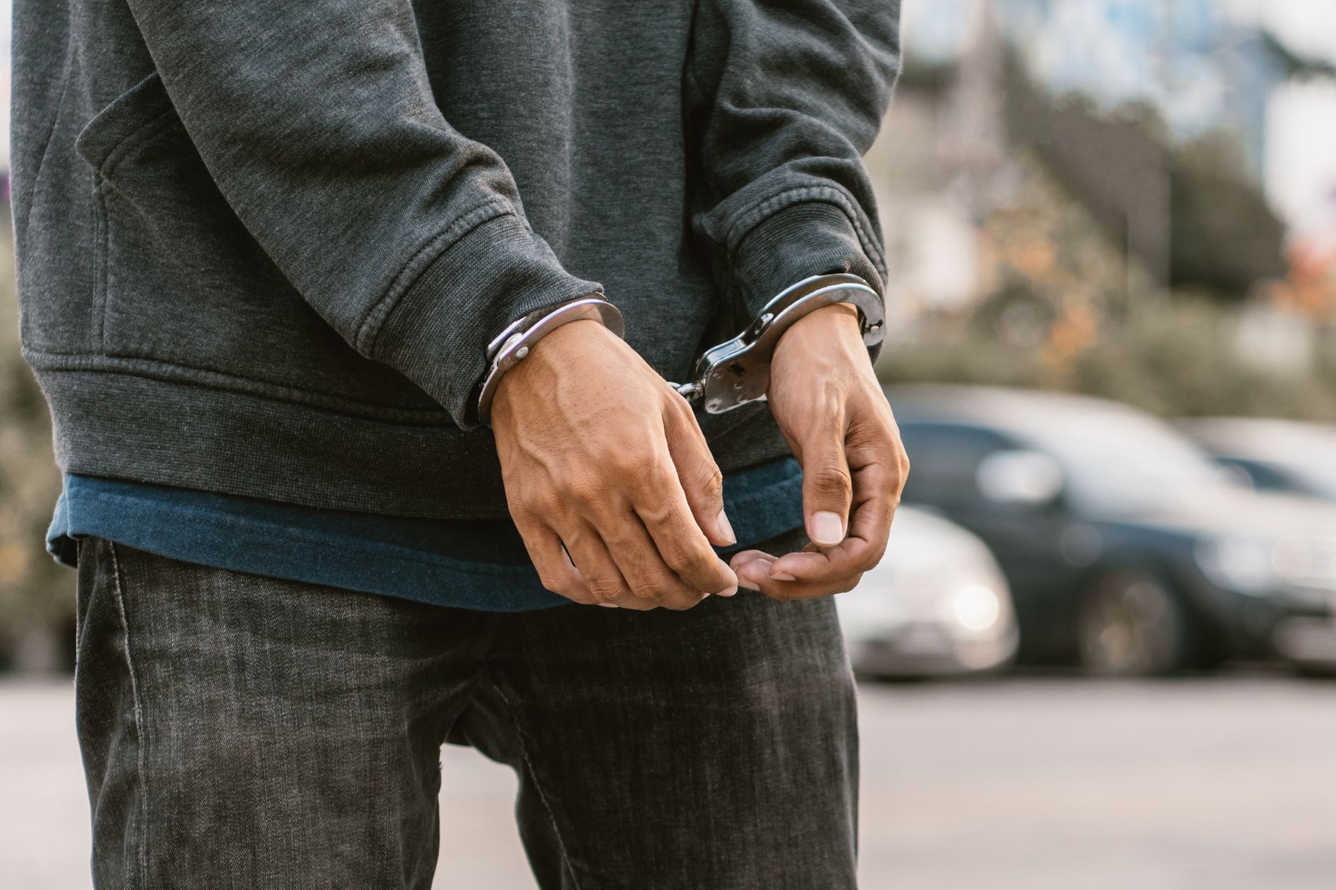 Handcuffed man.