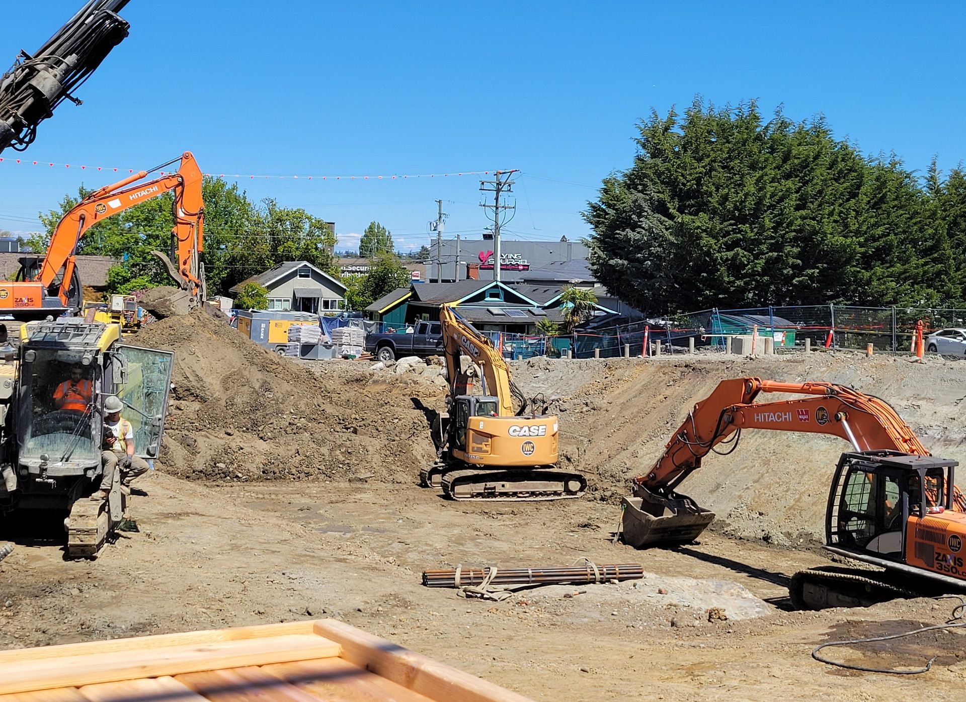 yellow excavator above the ground