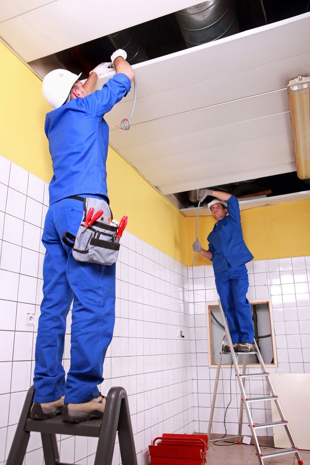 two electricians working