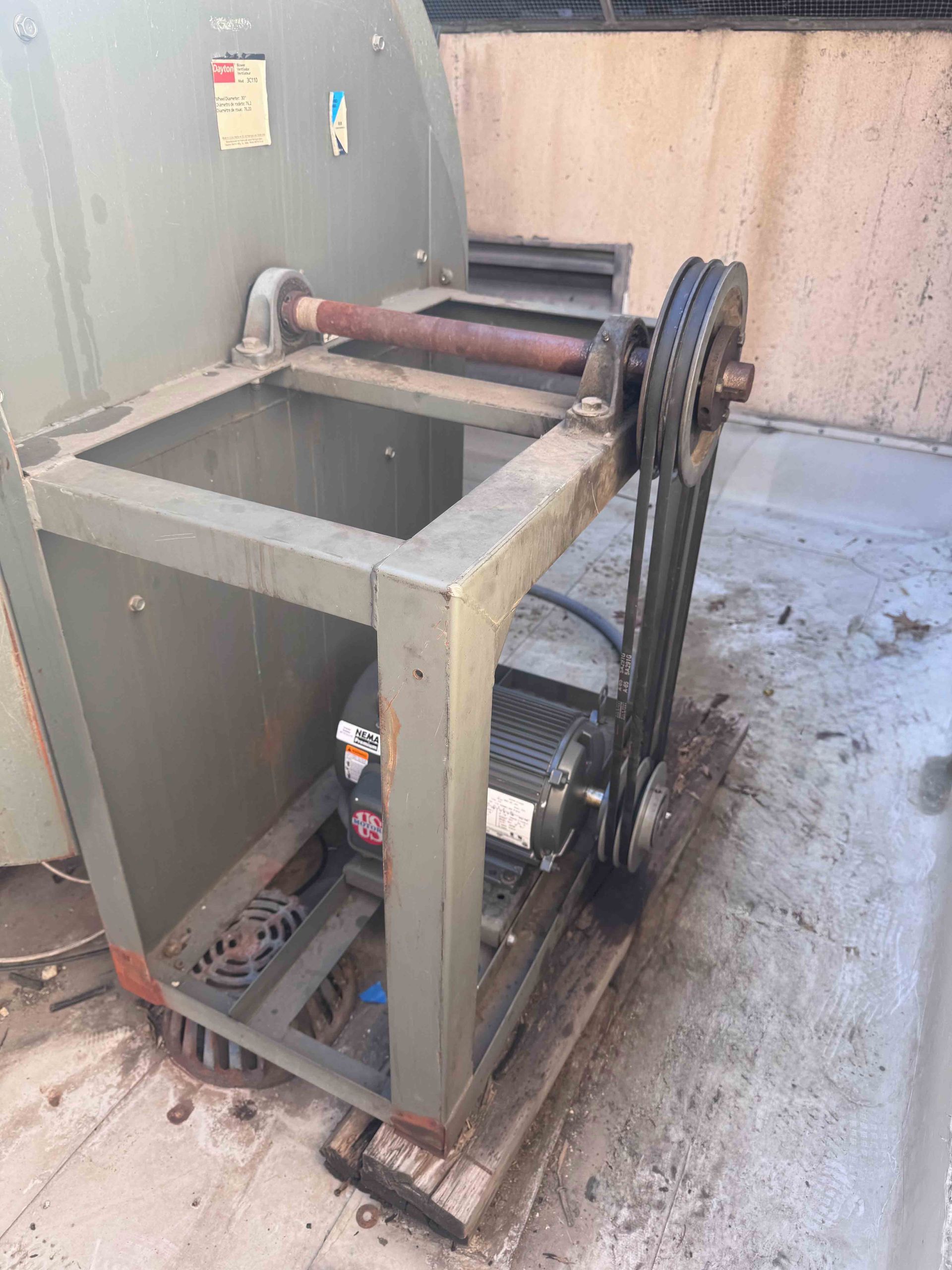 A large air conditioner is sitting on top of a building - Fort Worth, TX - A/C Kives Heating & Air Conditioning