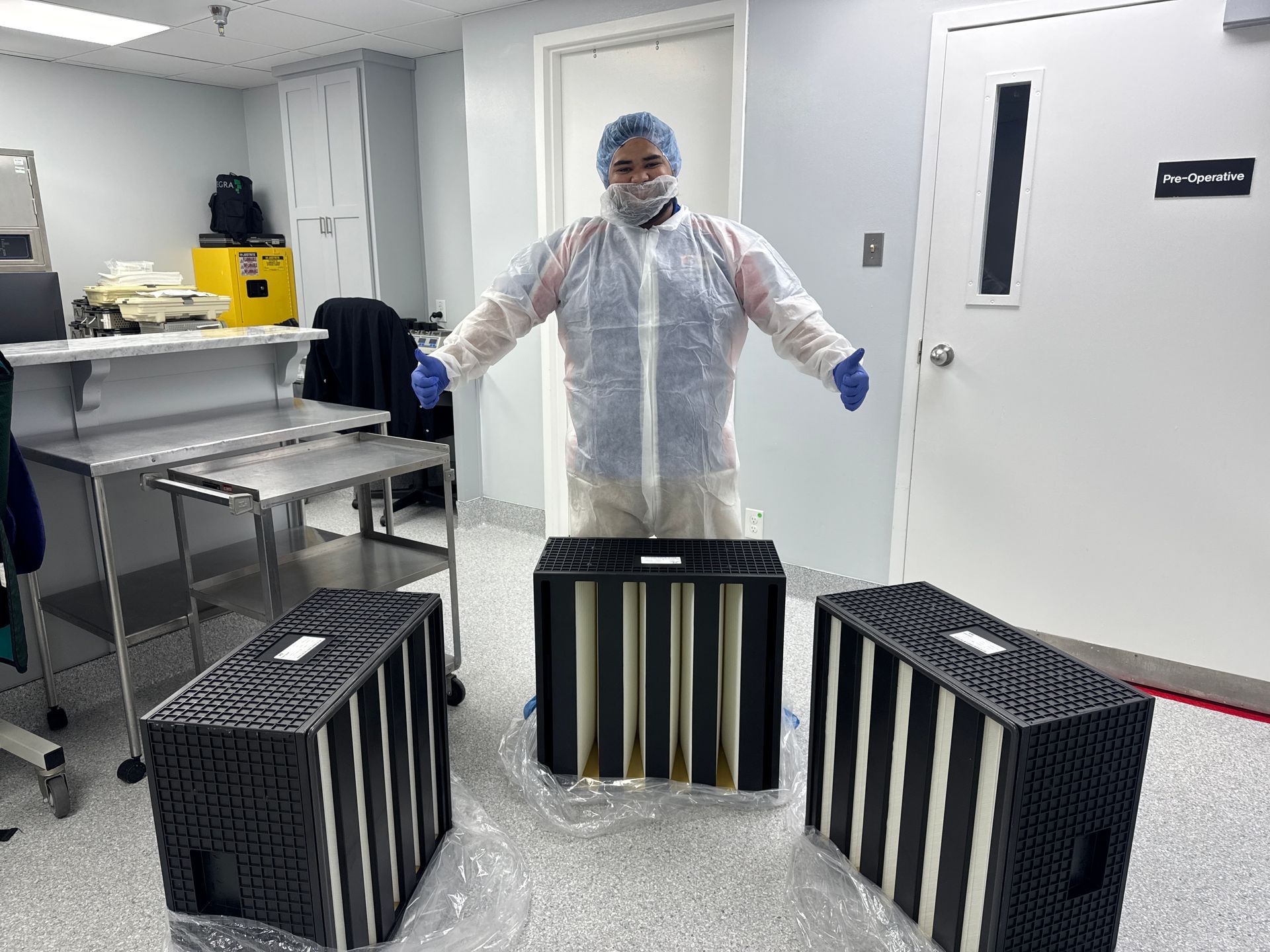 A Man Installing a Air Conditioning Unit on a Hospital - Fort Worth, TX - A/C Kives Heating & Air Conditioning