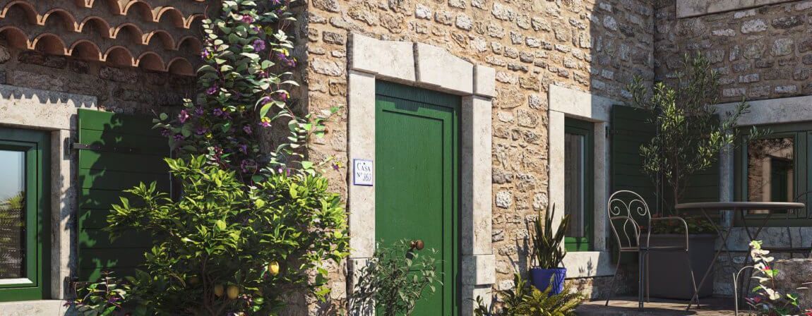 Een stenen gebouw met een groene deur en groene luiken.