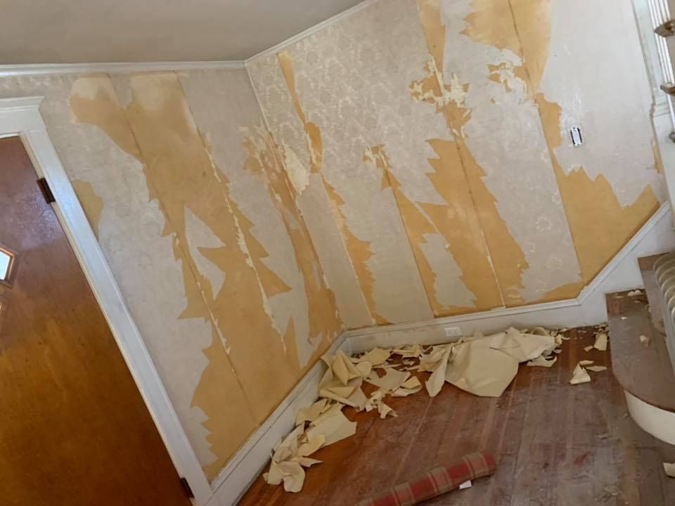 Room with Peeling Wallpaper on the Floor — North Hampton, NH — MG Painting And Hardwood Floor