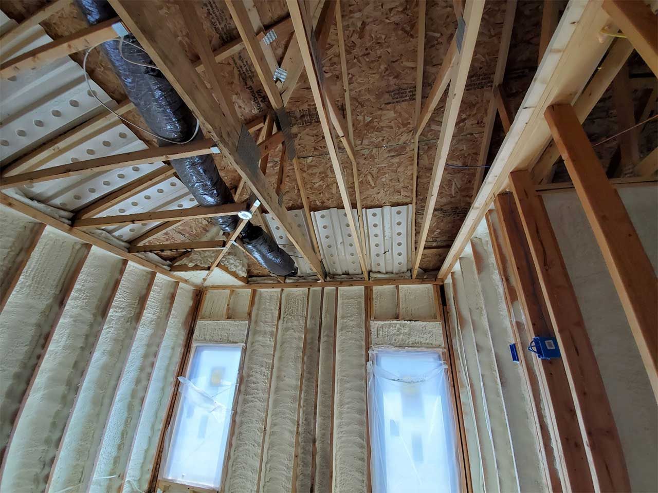 Looking up at the ceiling of a house under construction.