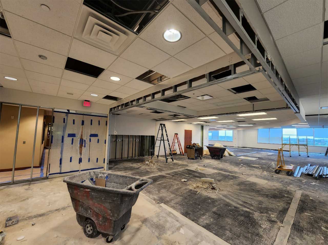 There is a wheelbarrow in the middle of the room.