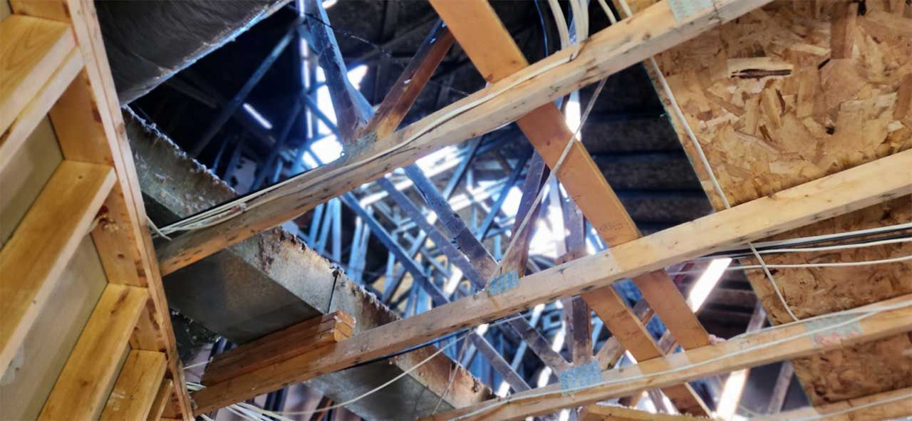 Looking up at the ceiling of a building under construction.