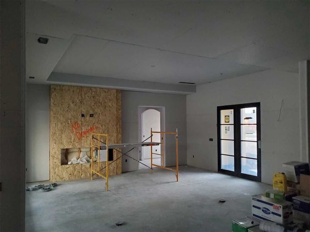 There is a scaffolding in the middle of the room.