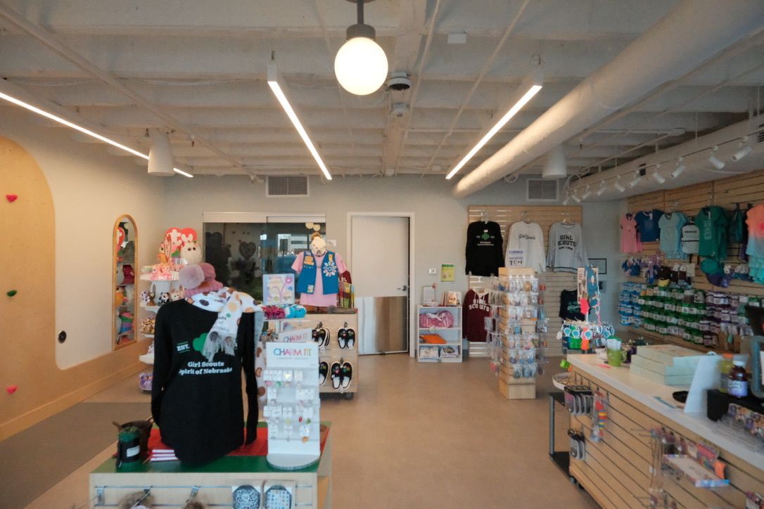 A store filled with lots of shirts and other items.