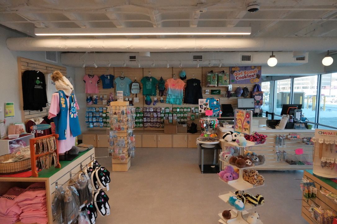 A store filled with lots of clothes and toys.