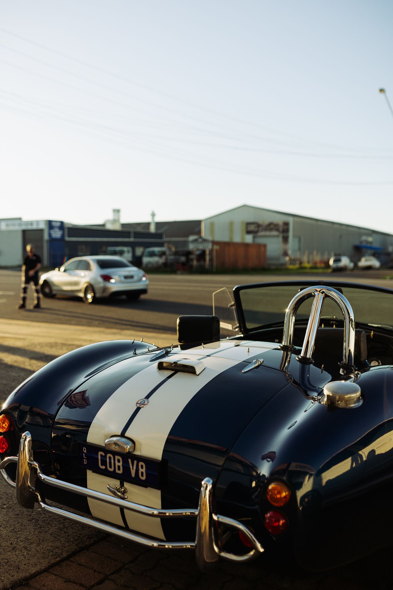 Rear View Of Blue Convertible Car With White Stripes Down Middle — Carline Automotive Solutions in Bungalow, QLD