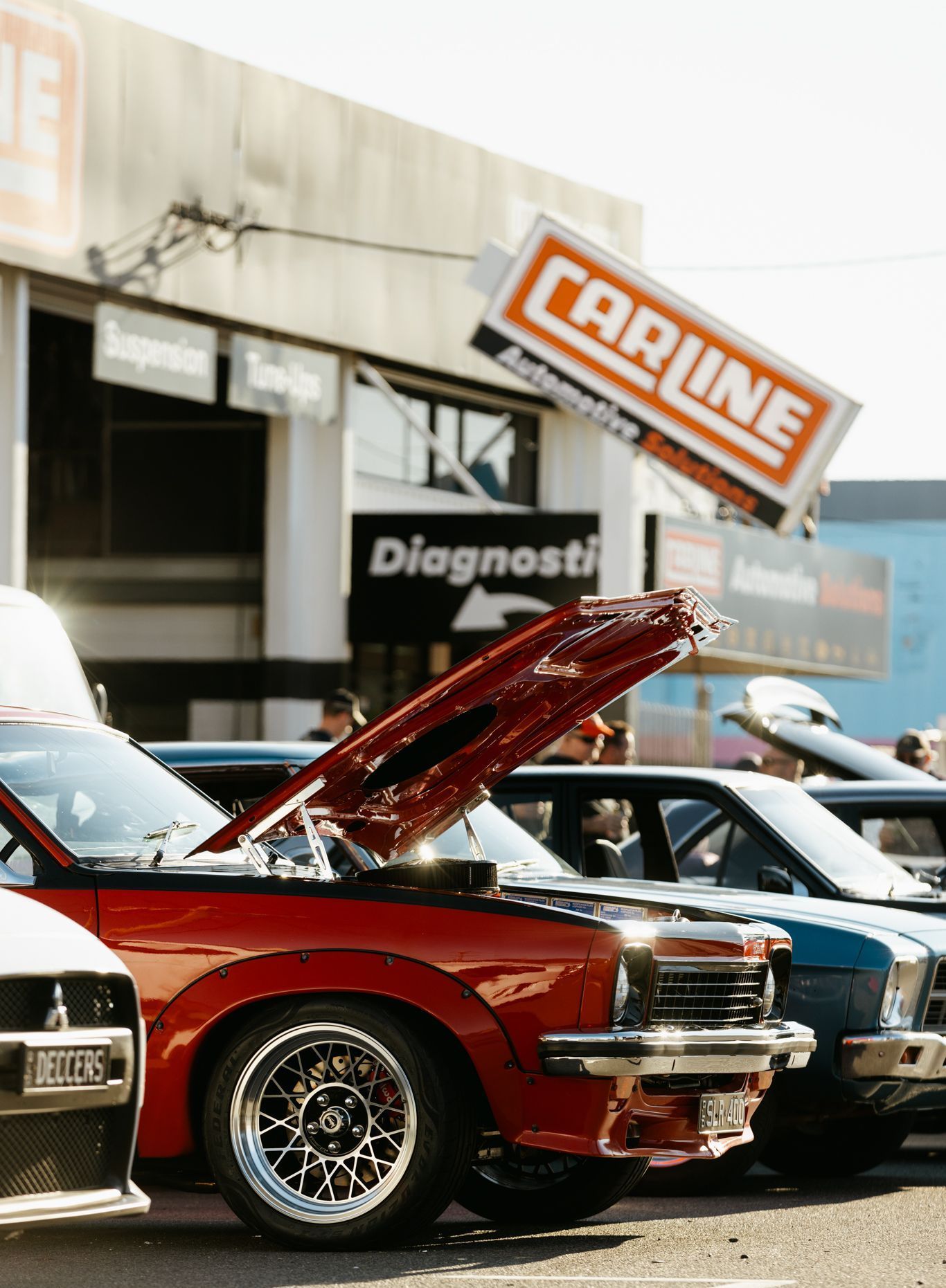 An Ariel View Of Cars Lined Up At Front Of Mechanic Warehouse — Carline Automotive Solutions in Bungalow, QLD