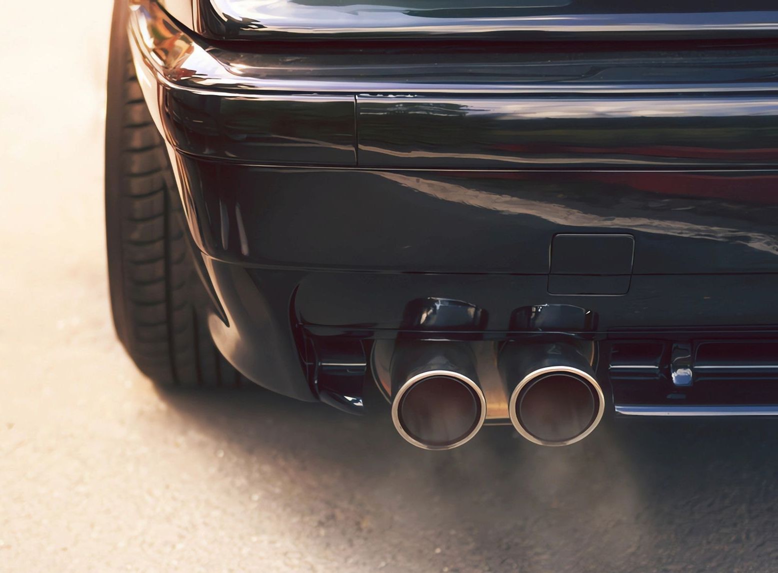 A Display Case Filled with A Variety of Stainless Steel Exhaust Pipes — Carline Automotive Solutions in Bungalow, QLD