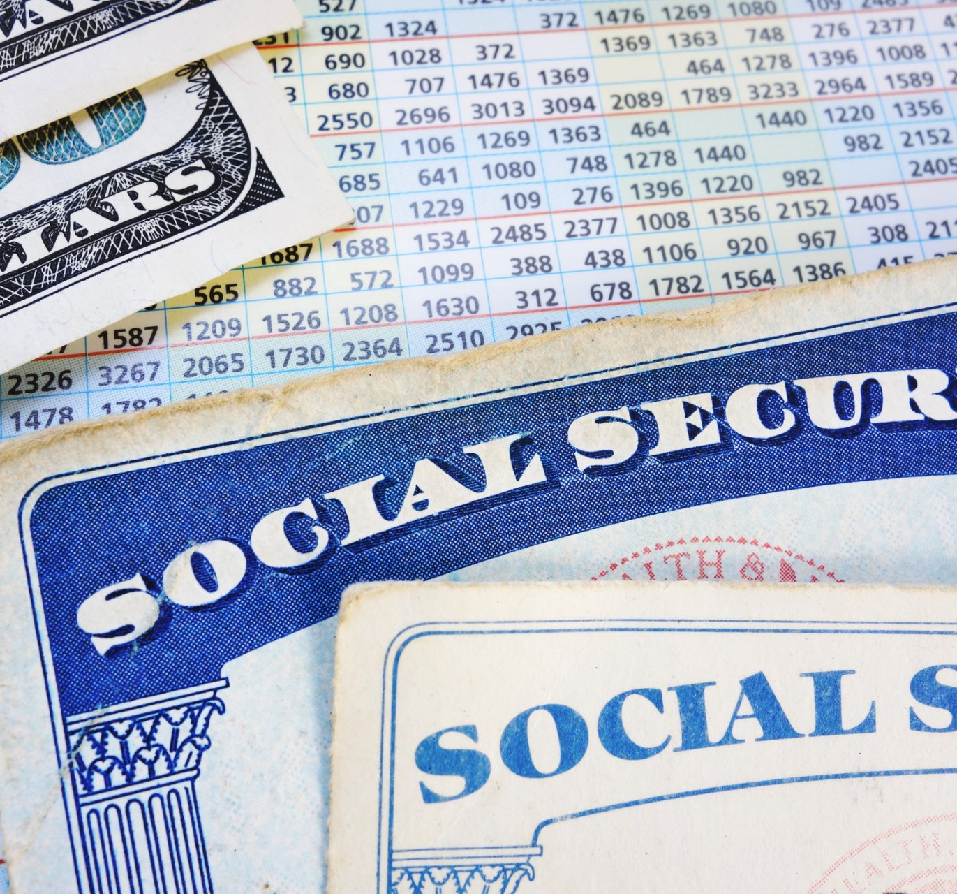 Social Security Cards and 100 Dollar Bills