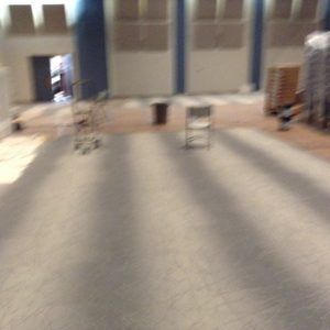 Carpet installation underway in large commercial venue by experienced flooring professionals in Plantation, FL.