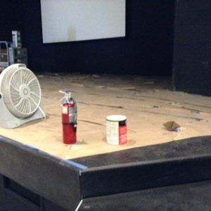 Stage surface prepped for carpet or vinyl installation by commercial flooring contractors in Plantation, FL.