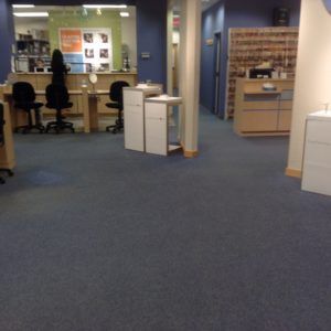 Finished commercial carpet work in a retail store by experienced flooring contractors in Plantation, FL.